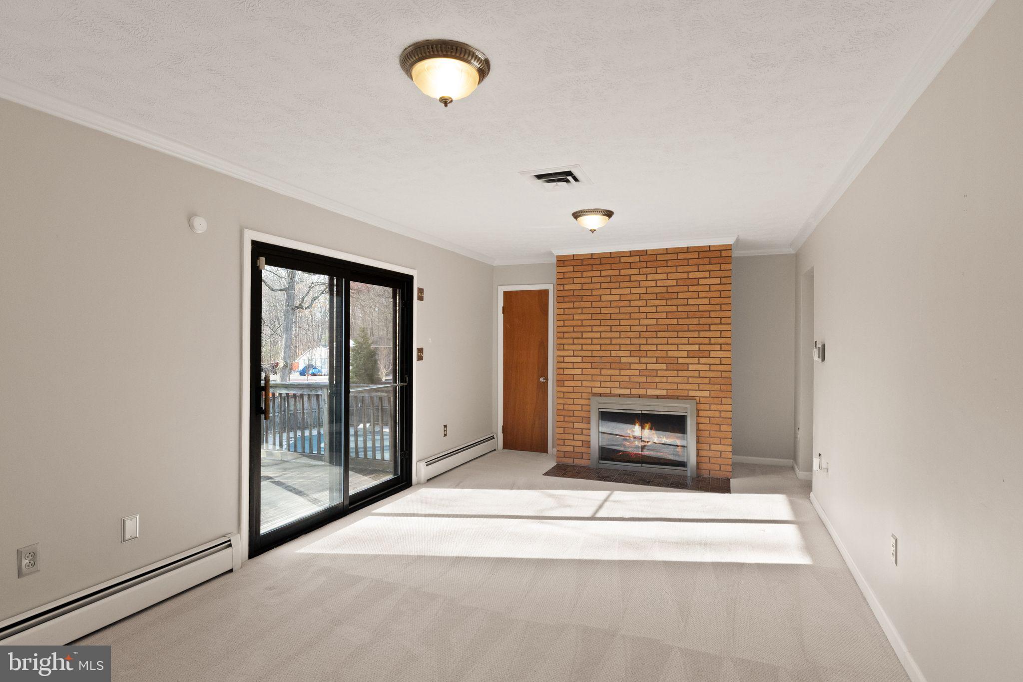 3801 Russell Road Woodbridge, VA 22192 - Photo 16 of 74 Family room with fireplace and rear deck access.