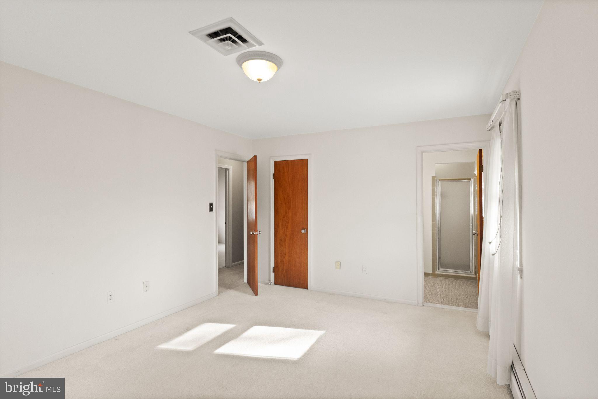 3801 Russell Road Woodbridge, VA 22192 - Photo 22 of 74 Primary bedroom with walk-in closet and en suite.