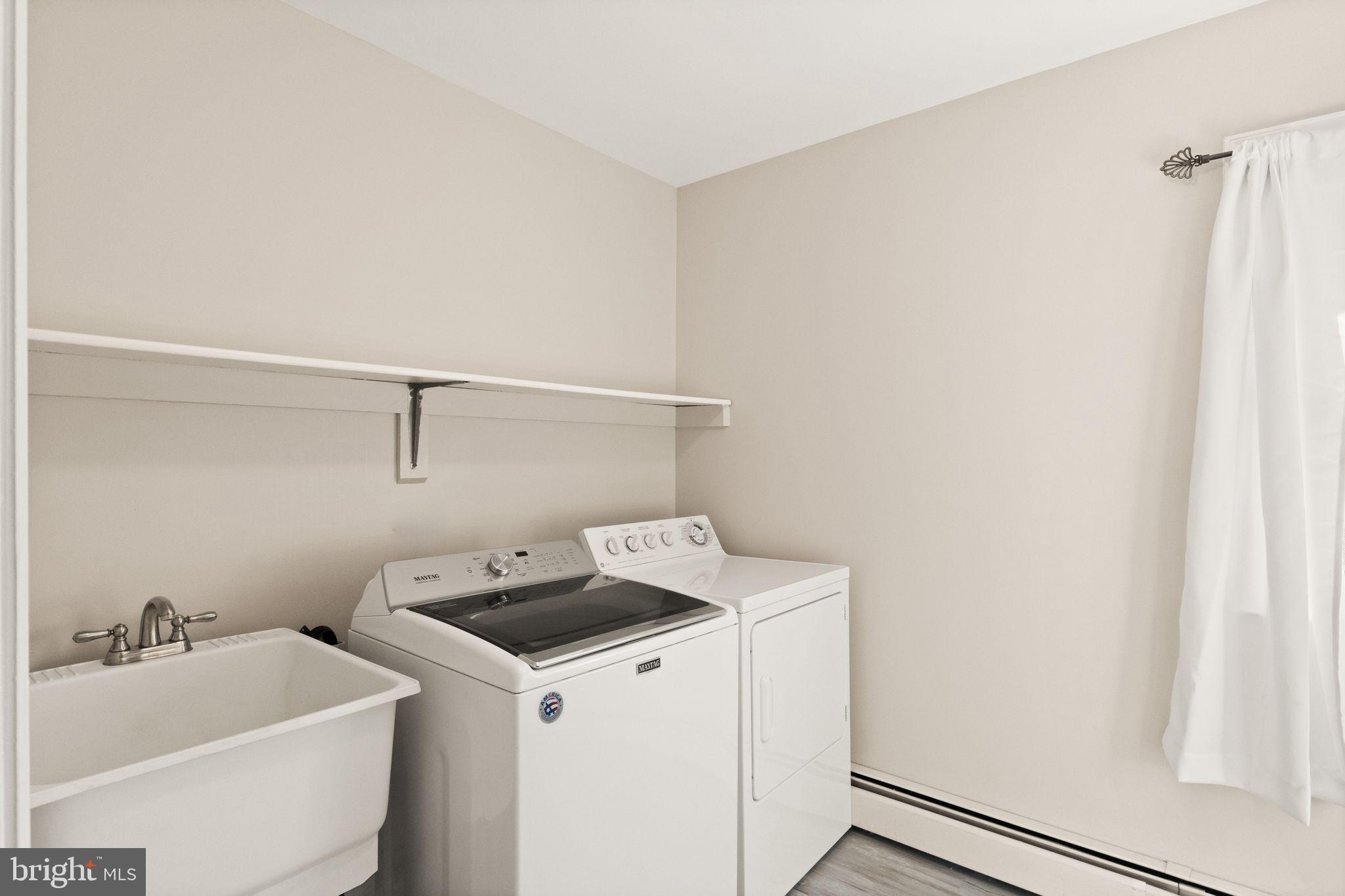 3801 Russell Road Woodbridge, VA 22192 - Photo 31 of 74 Main level laundry with sink.