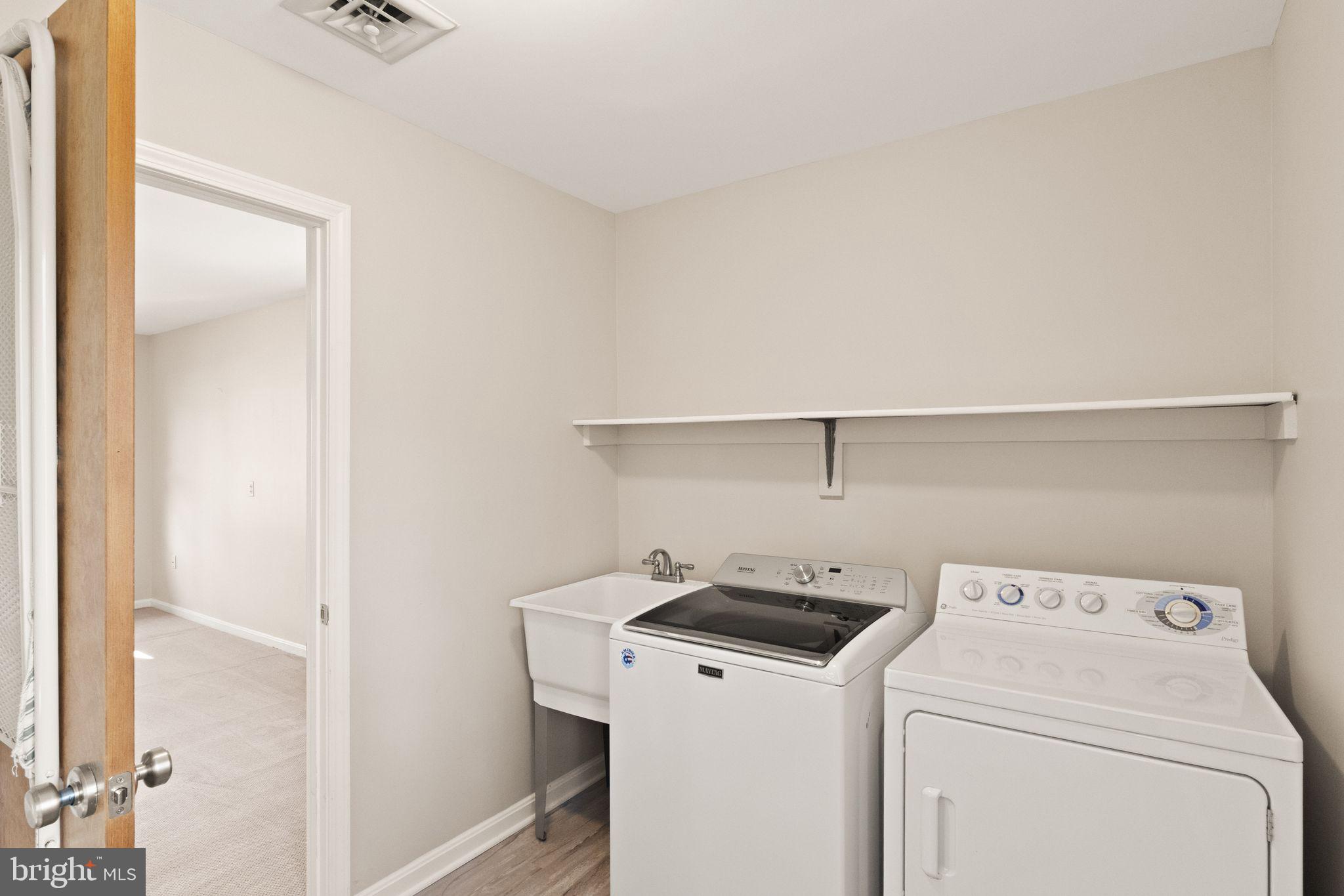 3801 Russell Road Woodbridge, VA 22192 - Photo 32 of 74 Main level laundry with sink.