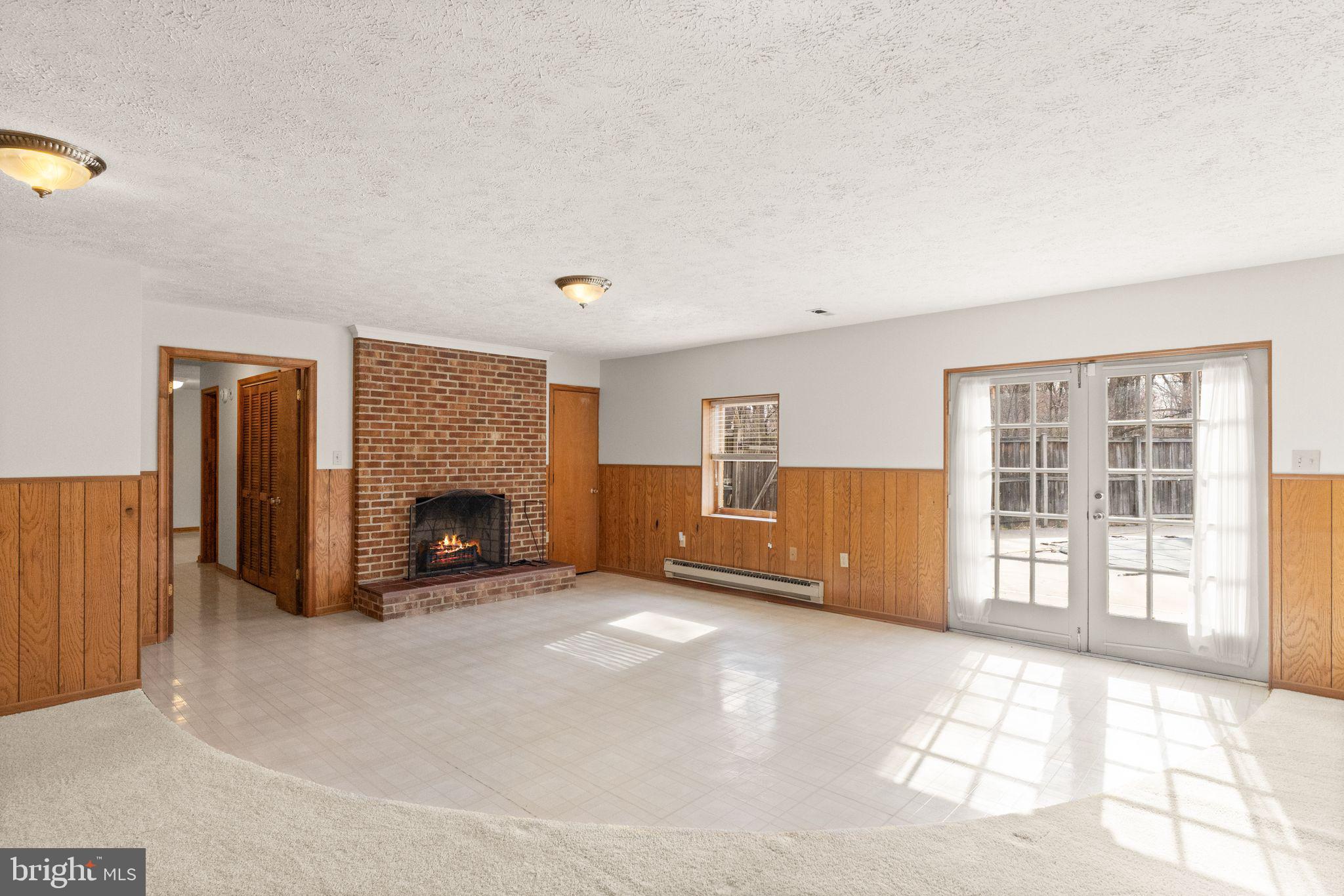 3801 Russell Road Woodbridge, VA 22192 - Photo 35 of 74 Basement with access to rear patio and pool.