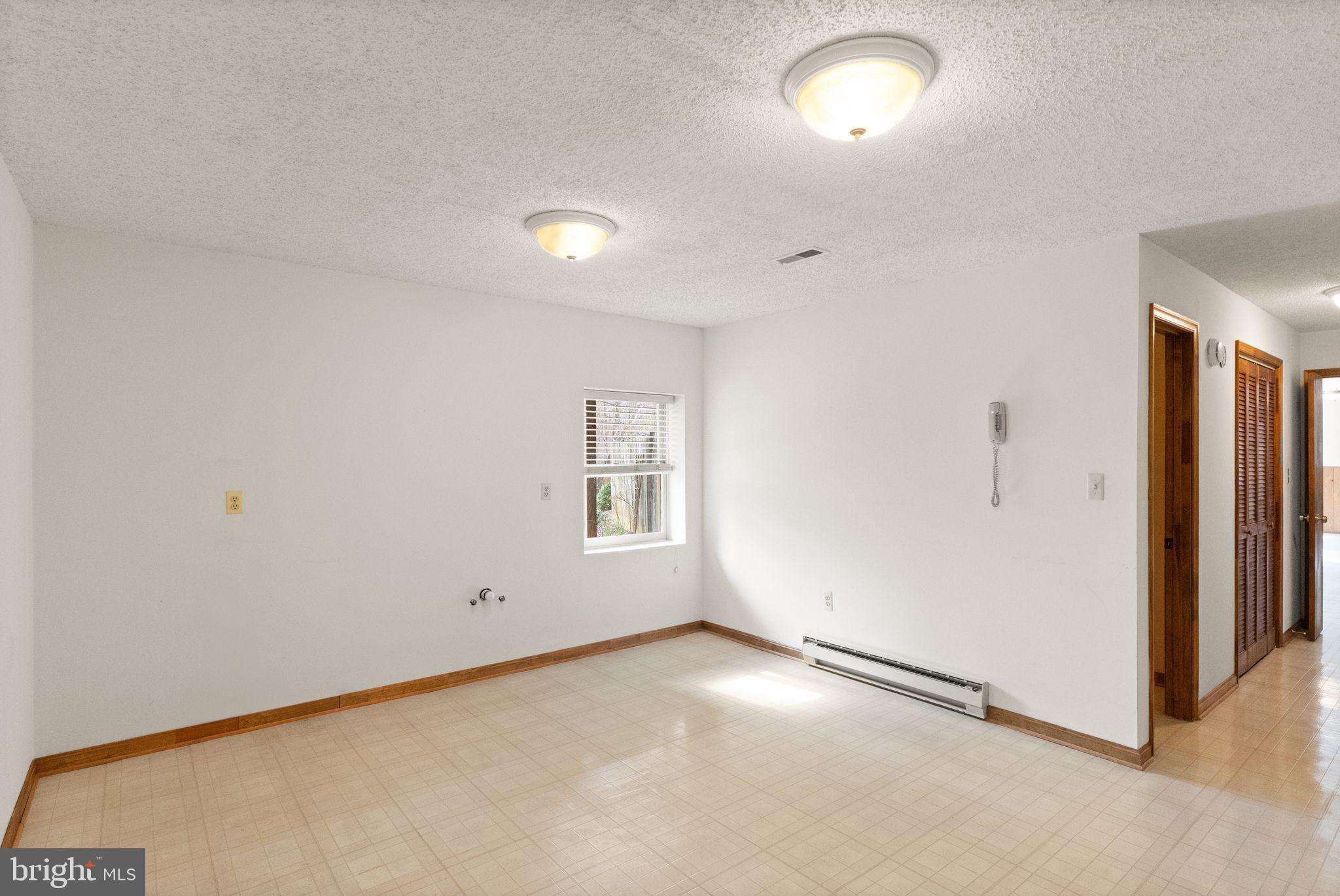 3801 Russell Road Woodbridge, VA 22192 - Photo 38 of 74 Basement family room with rough in plumbing.