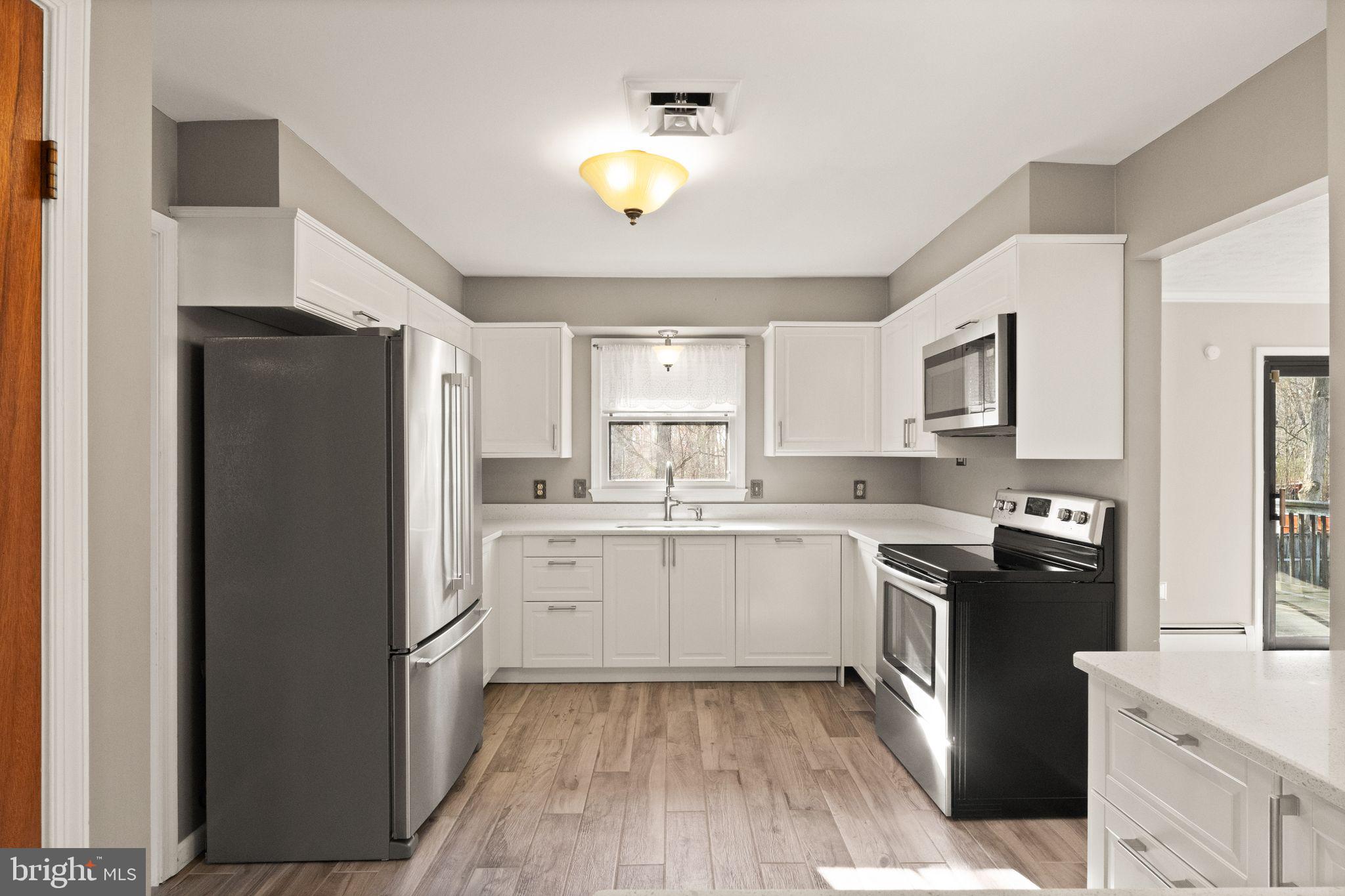 3801 Russell Road Woodbridge, VA 22192 - Photo 8 of 74 Updated kitchen with stainless appliances.
