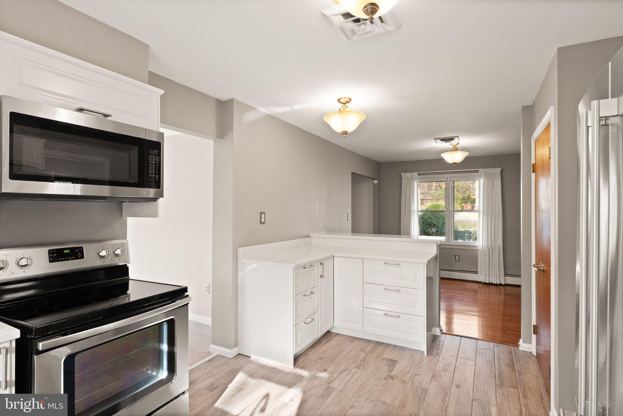 3801 Russell Road Woodbridge, VA 22192 - Photo 10 of 74 Extra cabinets and updated flooring.