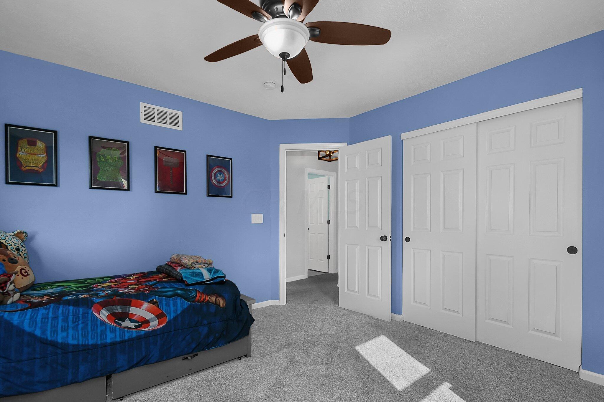 3620 Hyatts Road Powell, OH 43065 - Photo 31 of 54 2nd floor bedroom with blue walls and grey carpet.