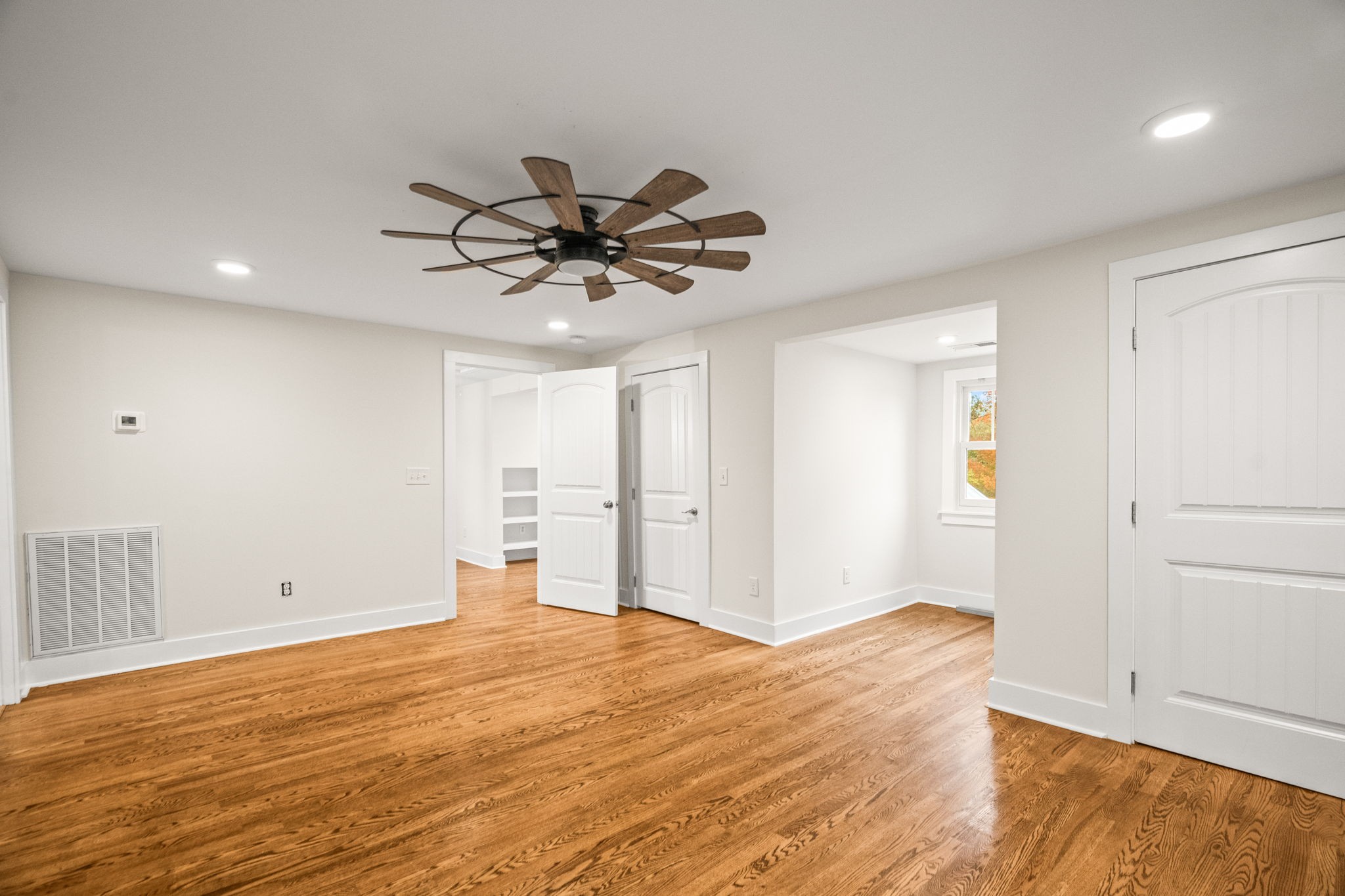 3863 Felts Road Cedar Hill, TN 37032 - Photo 12 of 32 a view of a big room with wooden floor and closet