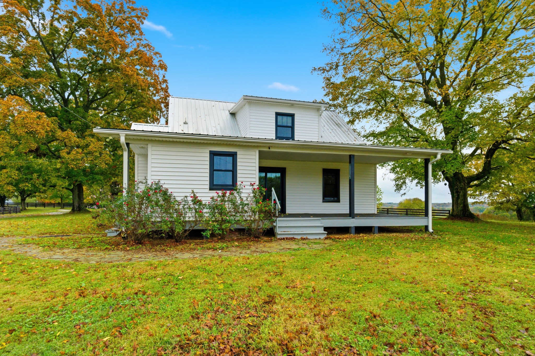 3863 Felts Road Cedar Hill, TN 37032 - Photo 15 of 32 a view of a house with garden and trees
