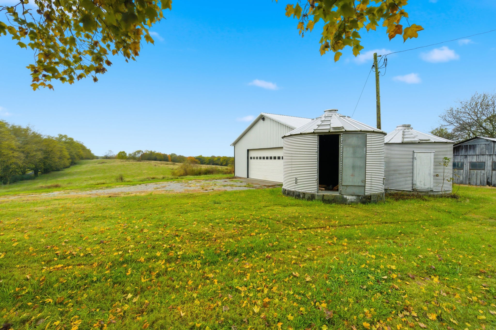 3863 Felts Road Cedar Hill, TN 37032 - Photo 20 of 32 a view of a house with a backyard