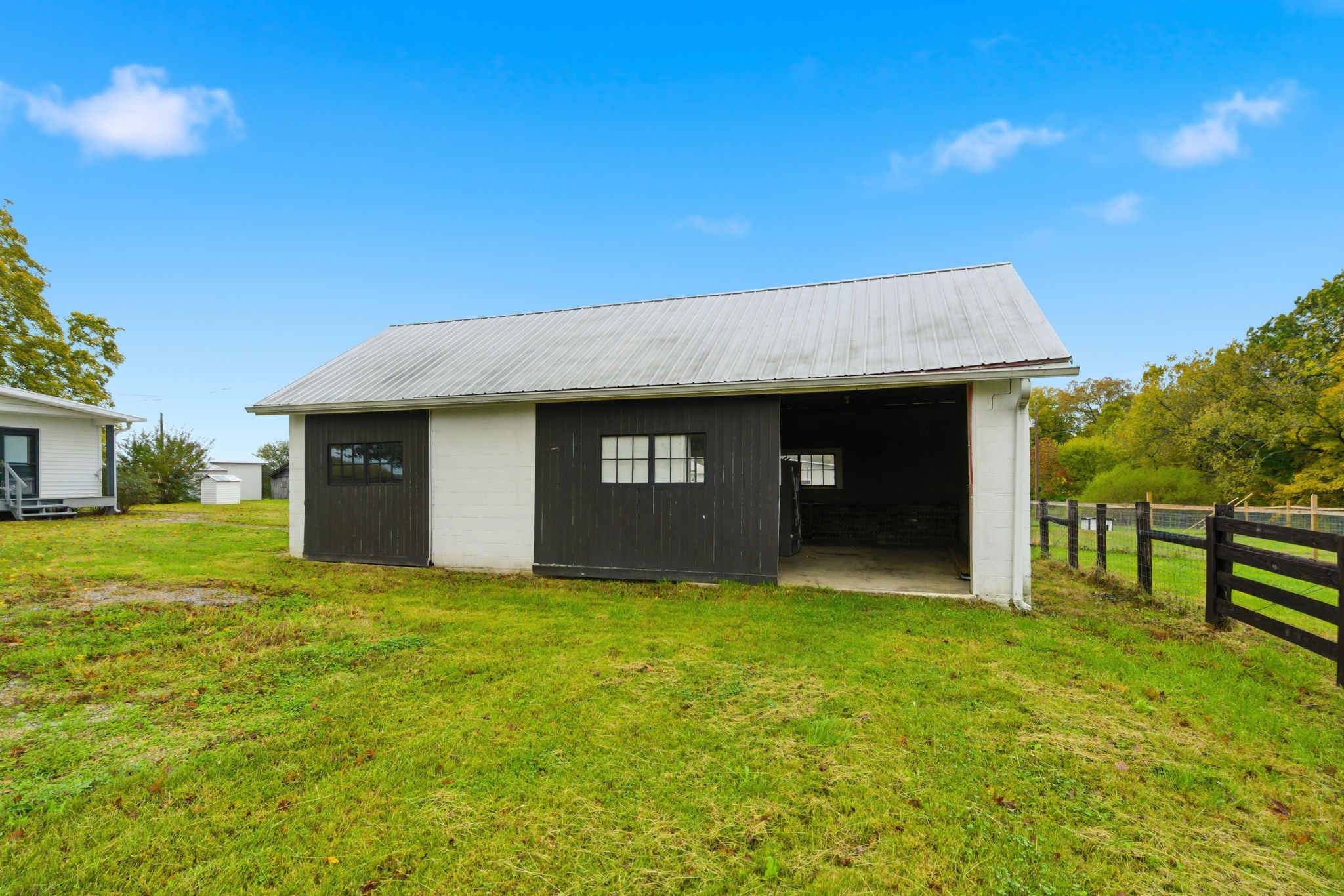 3863 Felts Road Cedar Hill, TN 37032 - Photo 24 of 32 a view of a house with a yard