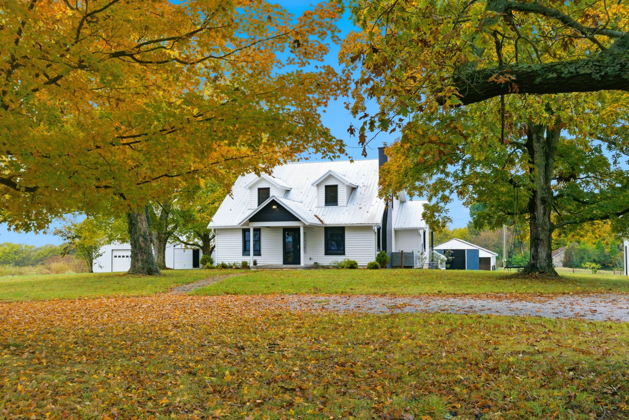 3863 Felts Road Cedar Hill, TN 37032 - Photo 3 of 32 a front view of a house with a yard