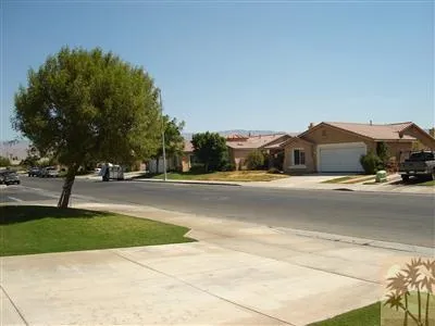 a view of street with houses