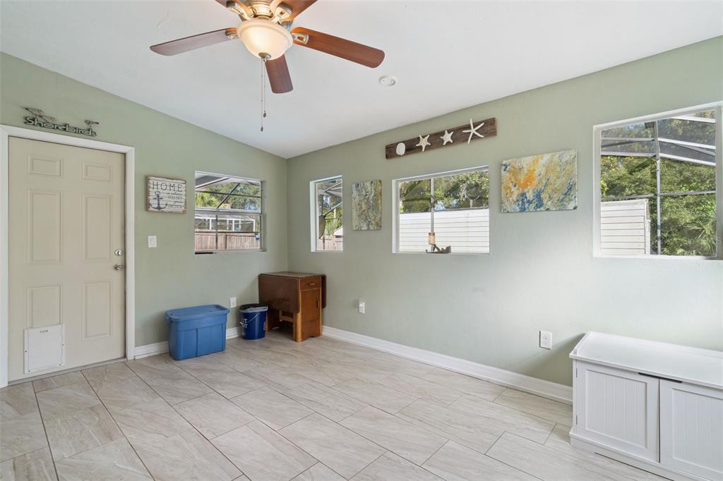 1547 Center Street DeLand, FL 32720 - Photo 27 of 37 a living room with furniture and a window