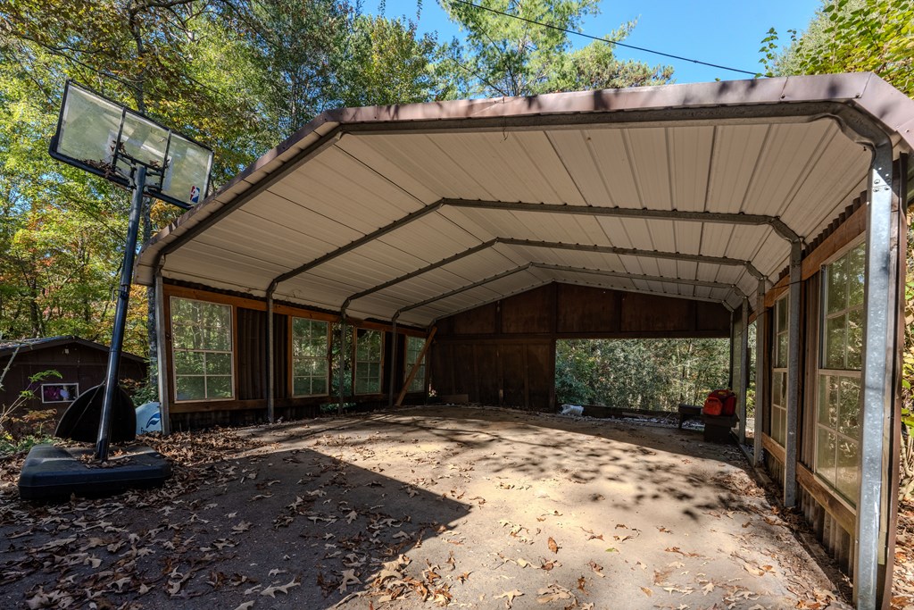 103 Cove Lane Murphy, NC 28906 - Photo 3 of 15 a view of a house with a small yard and a large tree