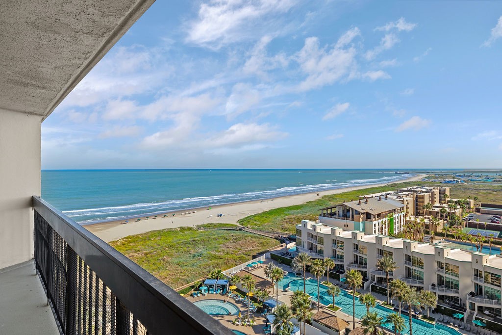 Breathtaking views from this 12th floor condo with one of kind double balcony! You have prime ocean views overlooking a pristine beach, a resort-style pool and complex with lush landscaping. Perfect BALCONY for watching and hosting a SpaceX WATCH PARTY!    Space X launches direct views from this condo balcony!
