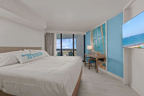 a view of a dining area with furniture and wooden floor