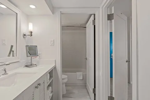 a outdoor living space with furniture and a floor to ceiling window