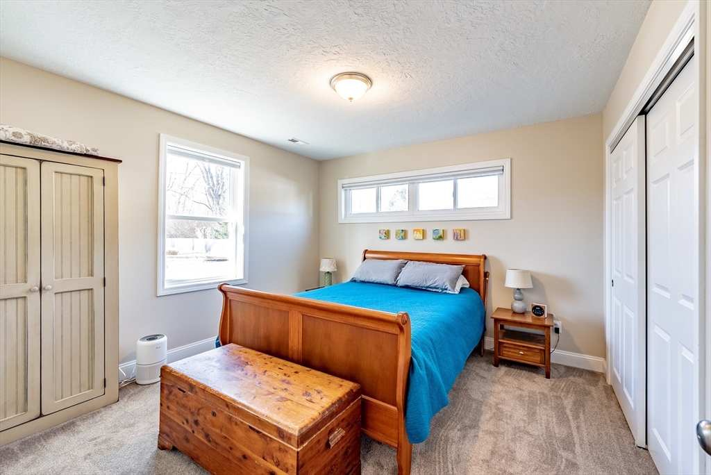 20 Ormond Drive Northampton, MA 01062 - Photo 16 of 32 a bedroom with a bed and a window