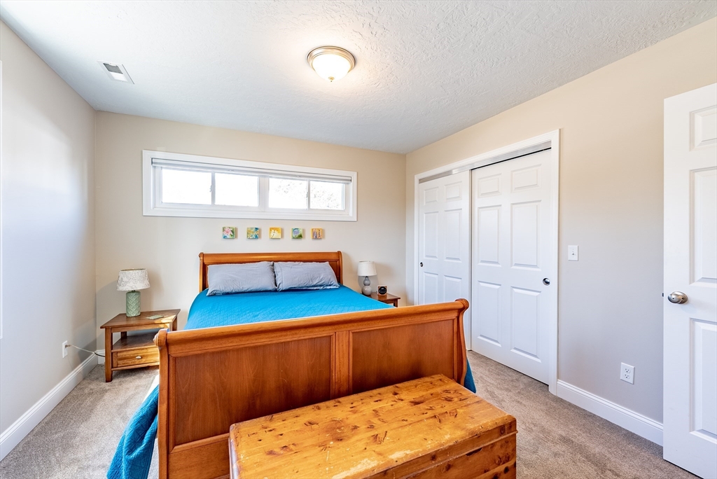 20 Ormond Drive Northampton, MA 01062 - Photo 18 of 32 a bed room with a bed and a window