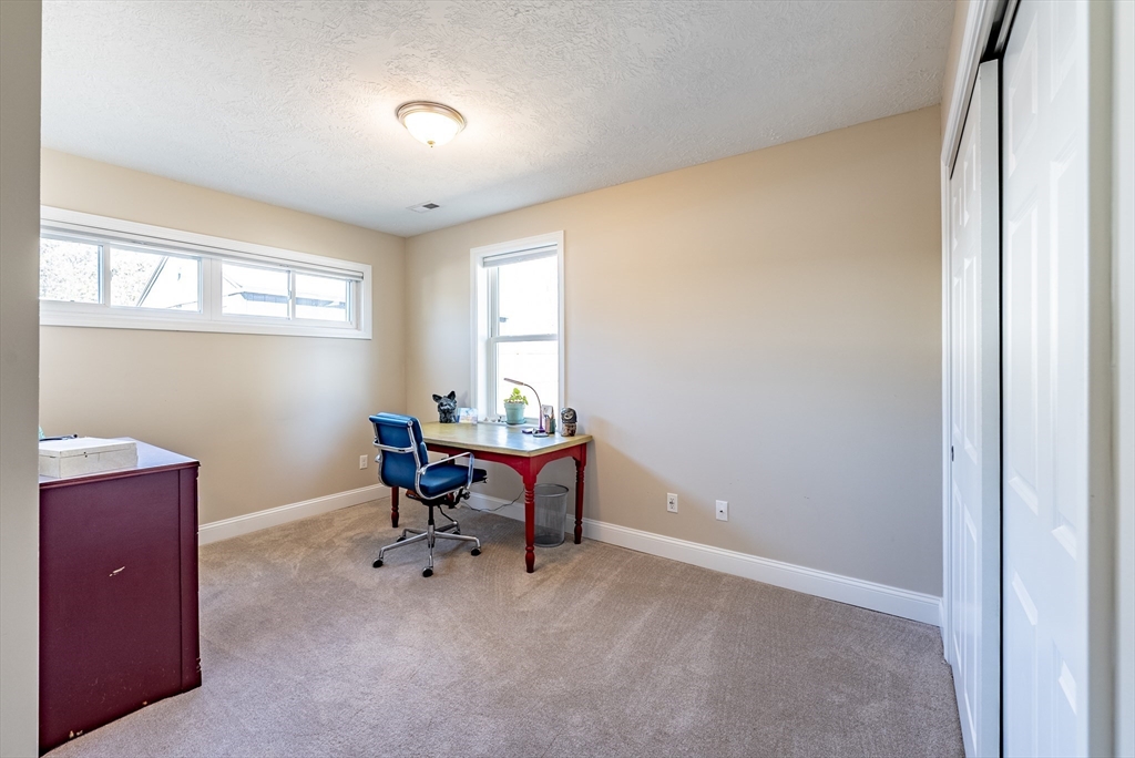 20 Ormond Drive Northampton, MA 01062 - Photo 21 of 32 a view of a workspace with furniture and a window