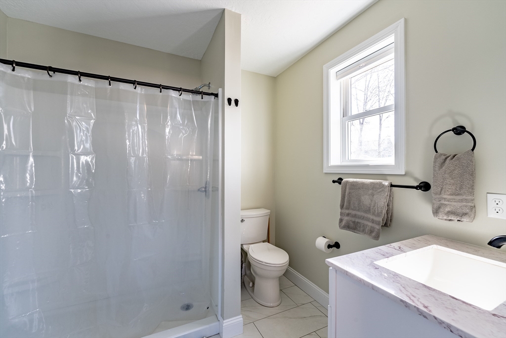 20 Ormond Drive Northampton, MA 01062 - Photo 24 of 32 a bathroom with a sink toilet and shower