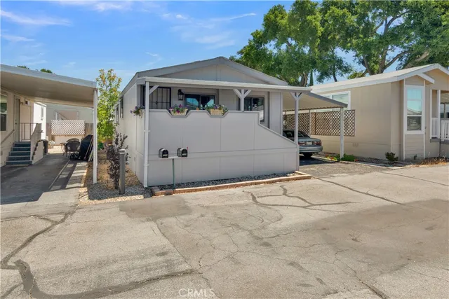 a front view of a house with a garage