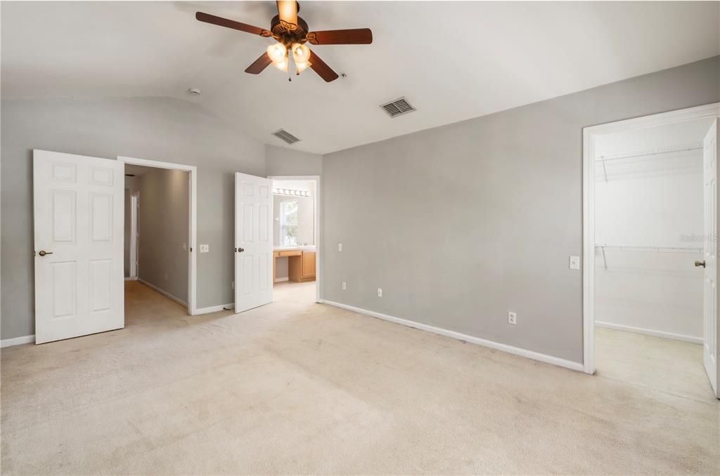 3151 Sinclair Street, Unit 101 Orlando, FL 32835 - Photo 12 of 18 wooden floor in an empty room