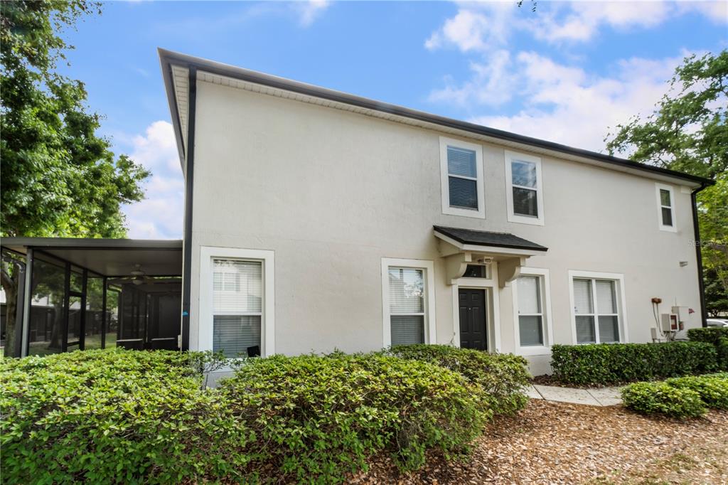 3151 Sinclair Street, Unit 101 Orlando, FL 32835 - Photo 18 of 18 a house view with a garden space