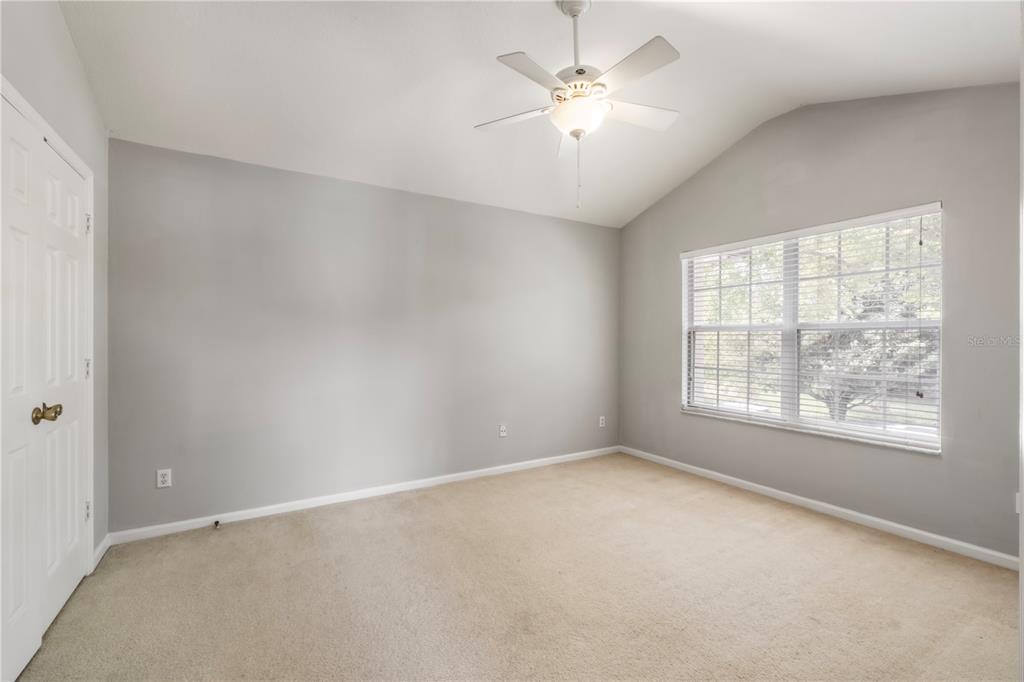 3151 Sinclair Street, Unit 101 Orlando, FL 32835 - Photo 7 of 18 an empty room with a window