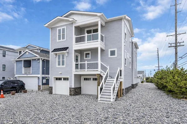 a front view of a house with balcony