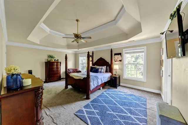 a bed room with furniture and a window