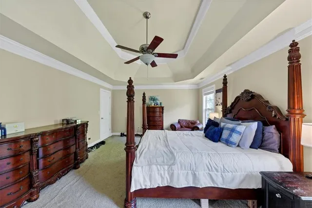 a view of a house with backyard