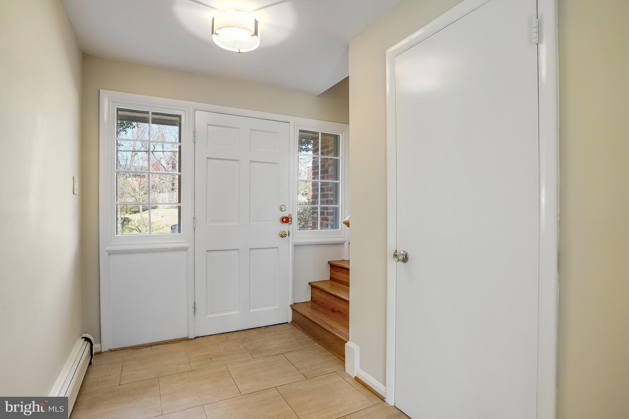 9815 Belhaven Road Bethesda, MD 20817 - Photo 3 of 53 Foyer with coat closet