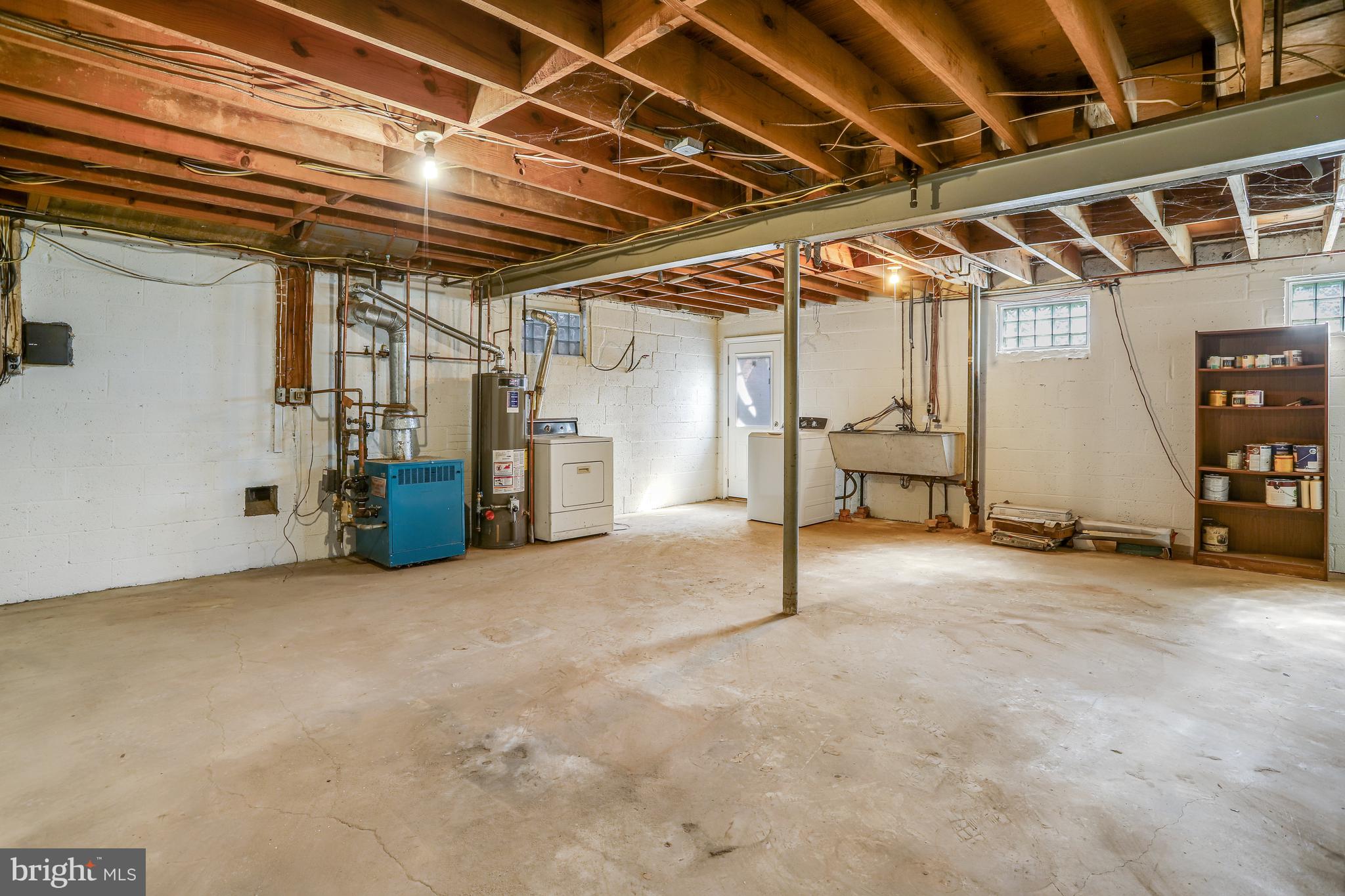 9815 Belhaven Road Bethesda, MD 20817 - Photo 43 of 53 Full unfinished basemen w walkout