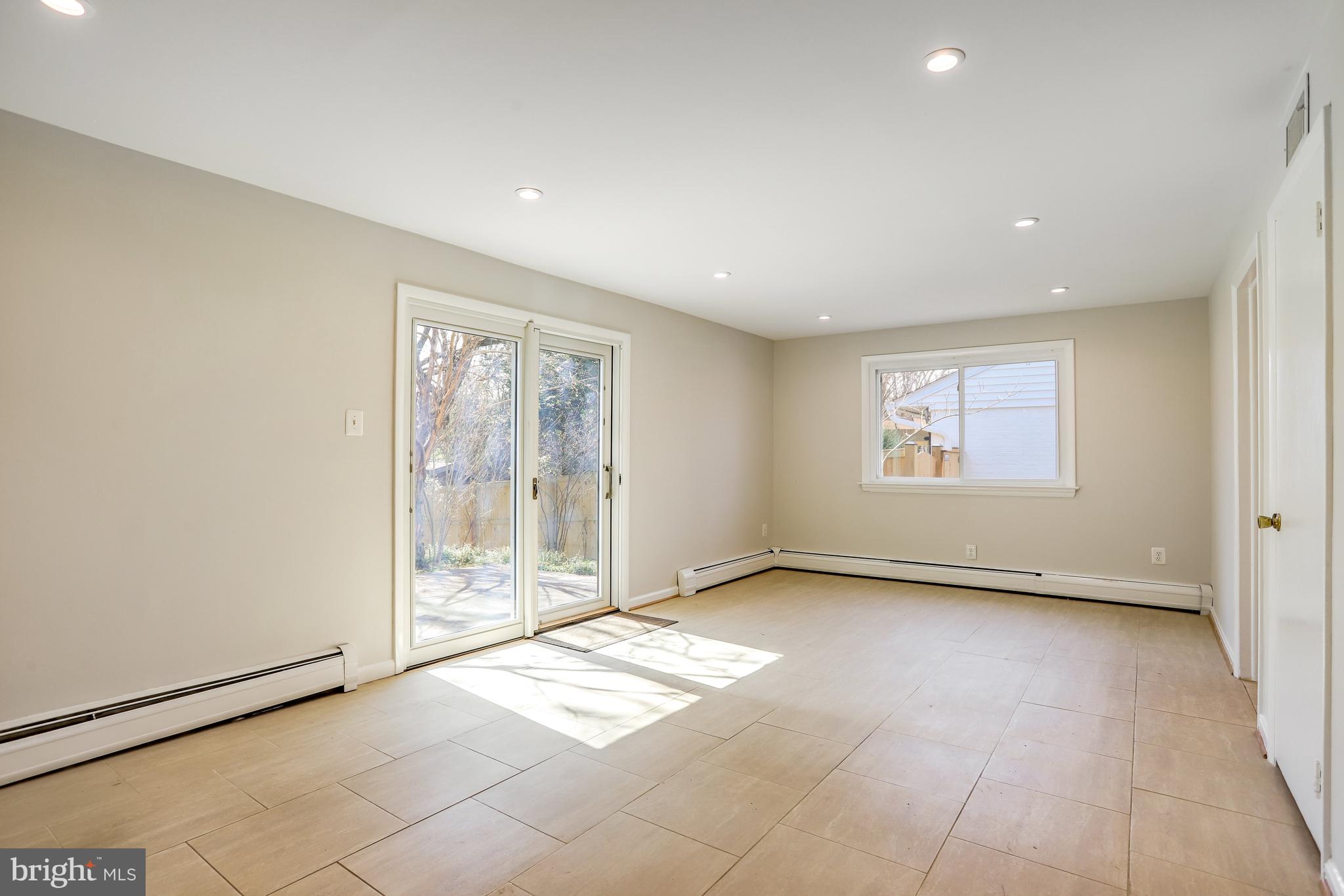 9815 Belhaven Road Bethesda, MD 20817 - Photo 6 of 53 Family room with door to backyard