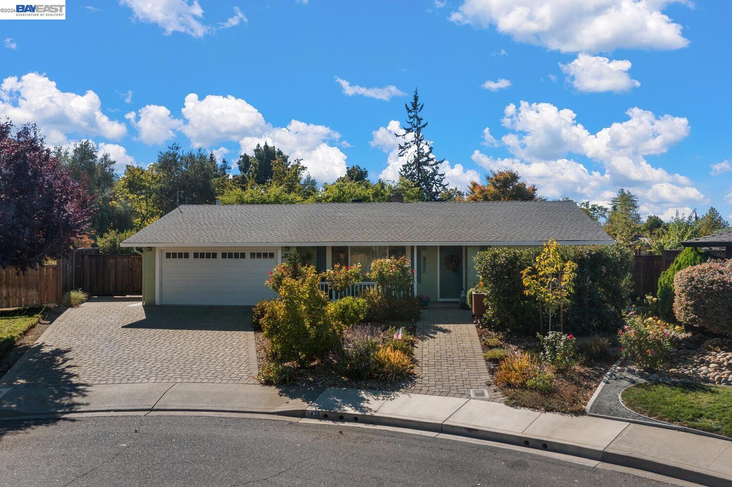 1835 Cairo Street Livermore, CA 94550 - Photo 1 of 1 a front view of a house with a yard and garden