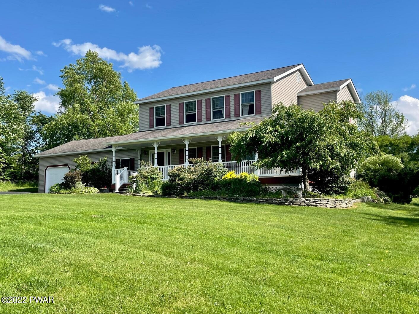 524 Creamton Drive Prompton, PA 18456 - Photo 6 of 57 a view of a house with a yard and sitting area