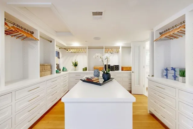 a view of living room with furniture and a window