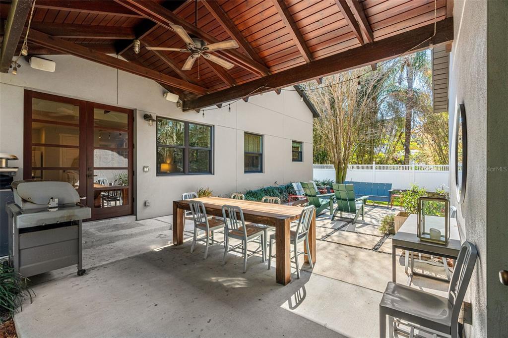 2501 Winter Park Road Winter Park, FL 32789 - Photo 32 of 63 a outdoor space with couches a barbecue grill a dining table and chairs with outer view