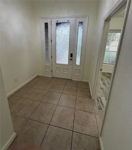 an empty room with window