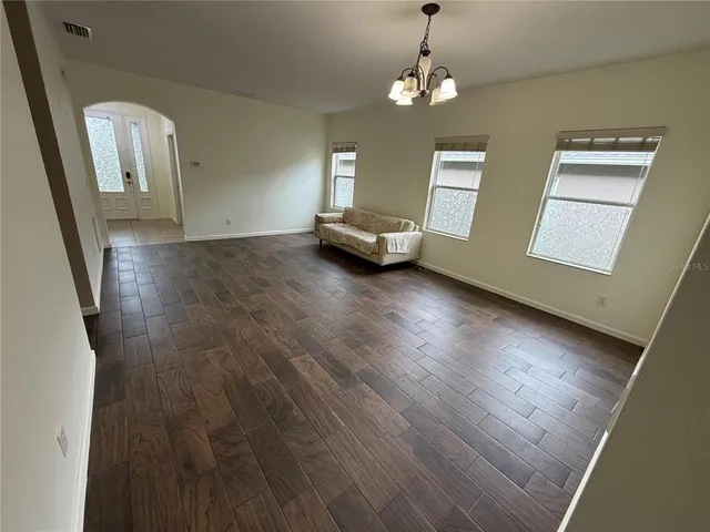 a view of livingroom with furniture and wooden floor