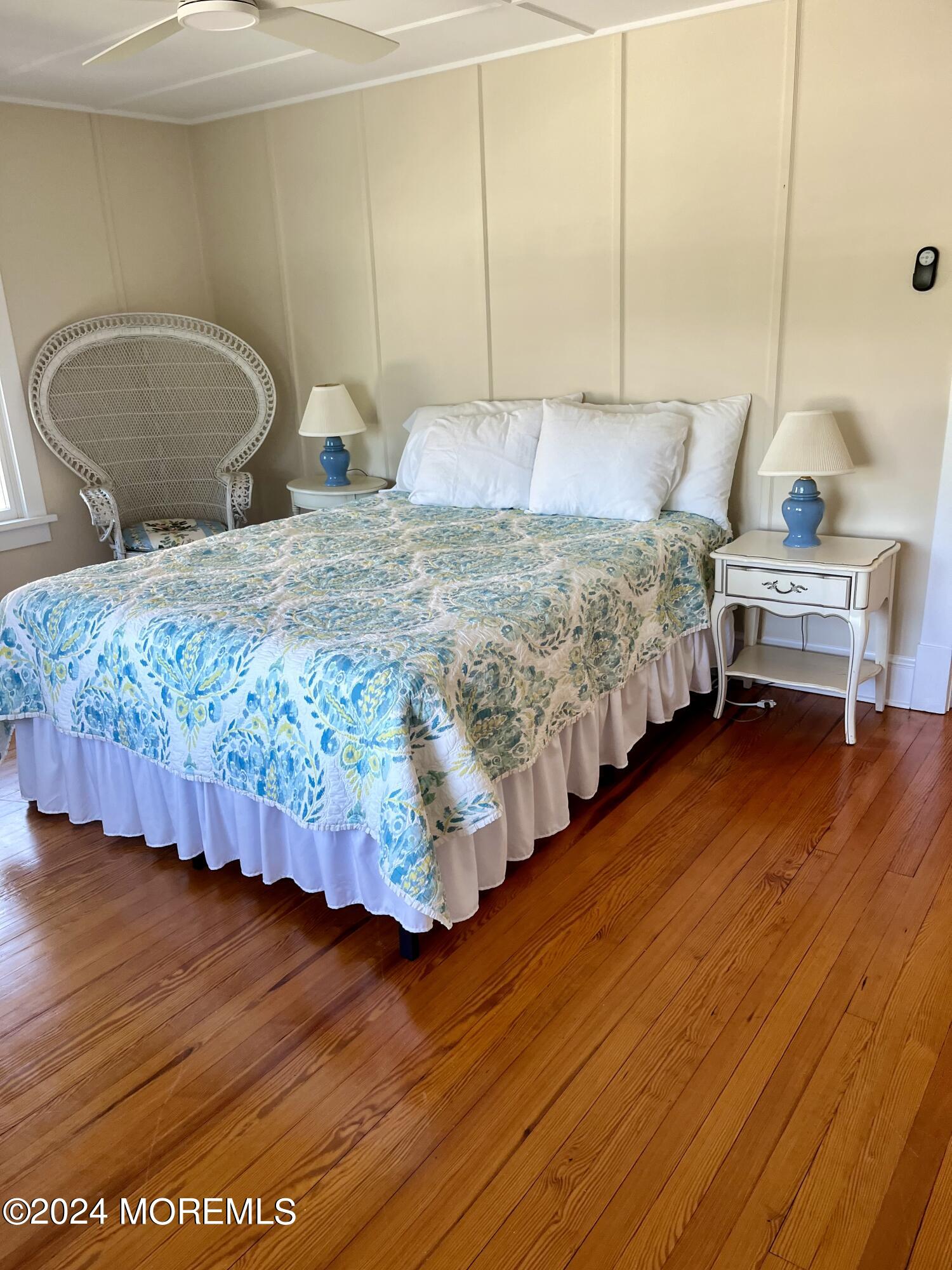 724 East Avenue, Unit SUMMER Bay Head, NJ 08742 - Photo 16 of 16 a bedroom with bed and wooden floor