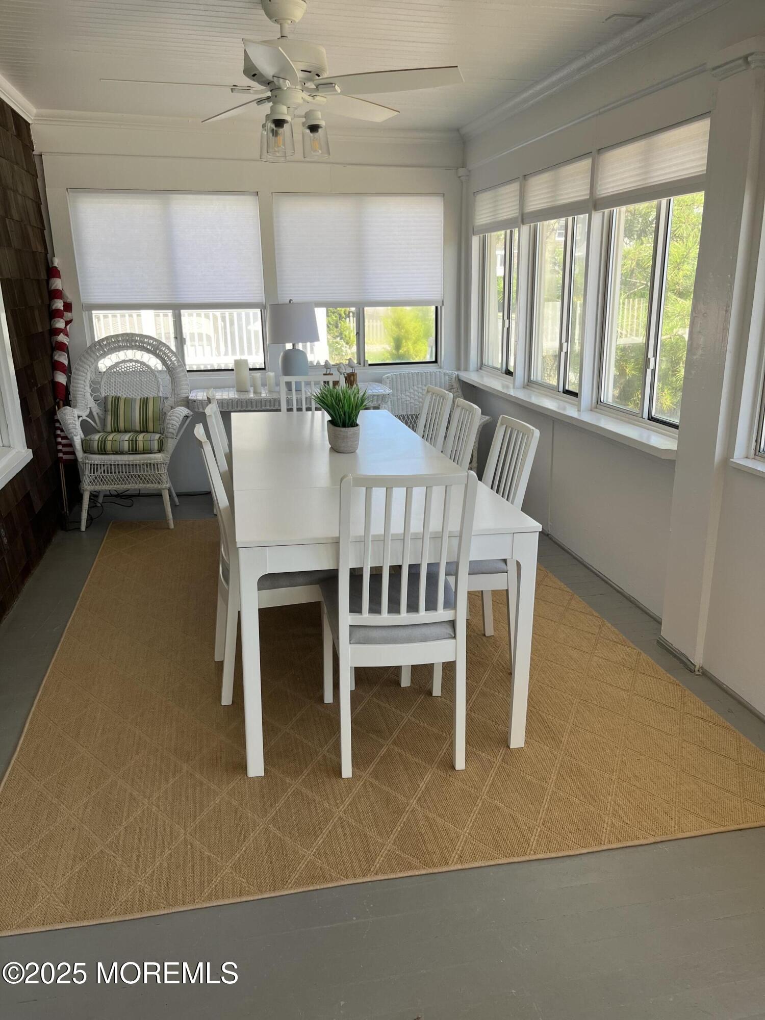 724 East Avenue, Unit SUMMER Bay Head, NJ 08742 - Photo 5 of 16 a dining room with furniture and window