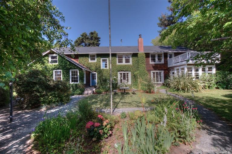 324 Mesa Road Point Reyes Station, CA 94956 - Photo 1 of 1 a front view of a house with a yard