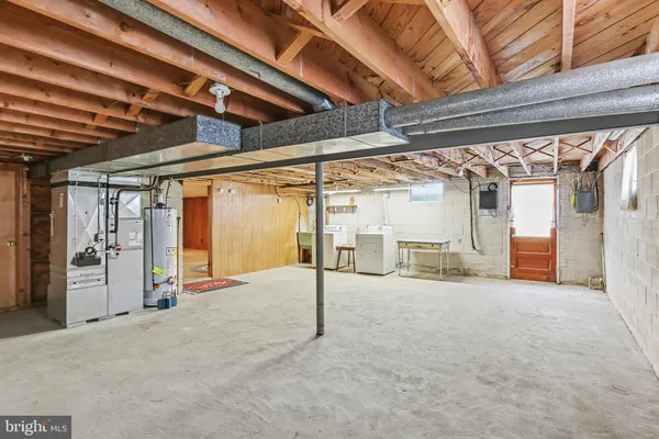 a view of a room with wooden walls