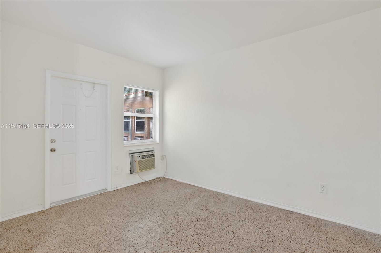 140 Southwest 30th Court, Unit 148 Miami, FL 33135 - Photo 8 of 18 a big room with closet and windows