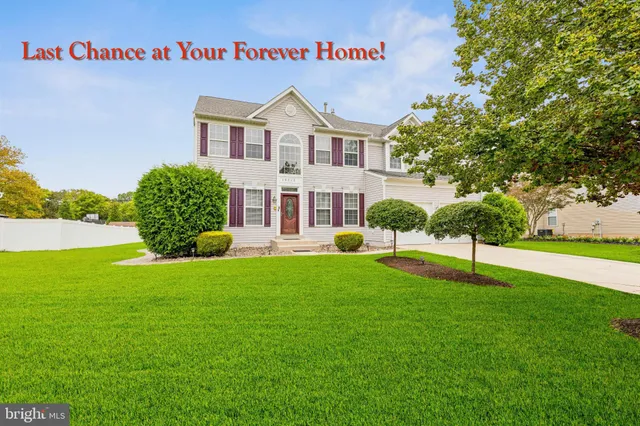 a house with garden in front of it