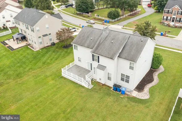 a view of a house with a swimming pool