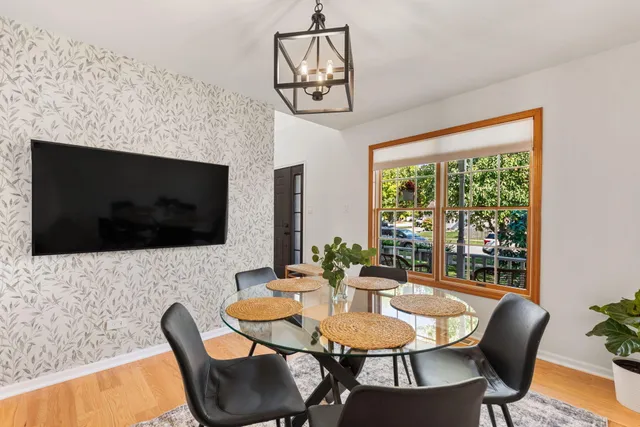 a view of a dining room with furniture window and outside view