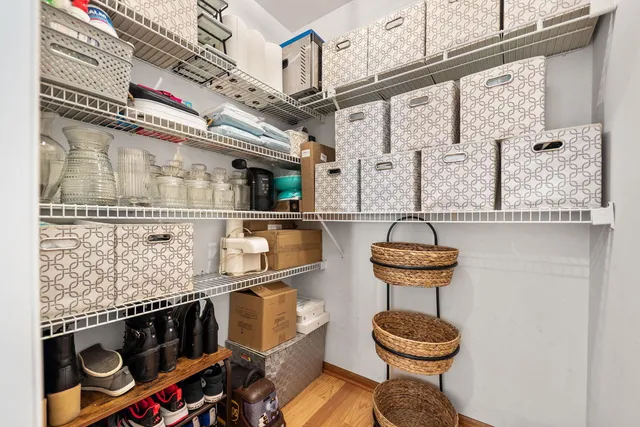 a bathroom with a toilet a sink and a mirror