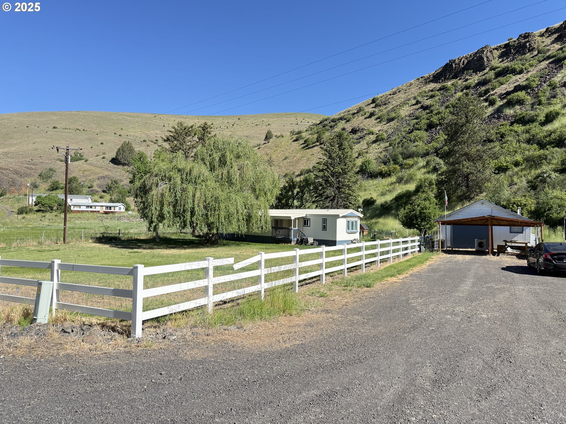 63615 East Birch Creek Road Pilot Rock, OR 97868 - Photo 1 of 15 a view of a house with a yard and sitting area